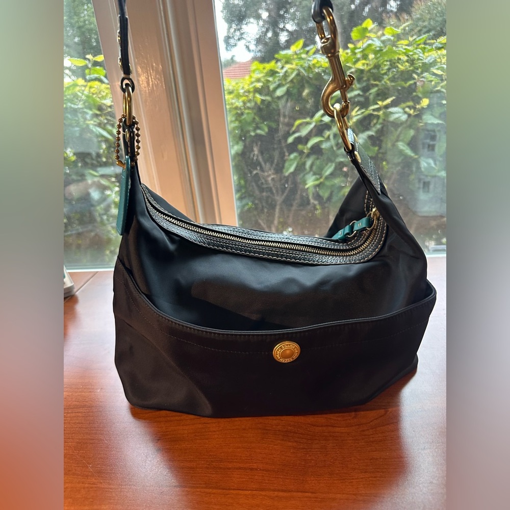 Coach black nylon hobo bag with teal interior